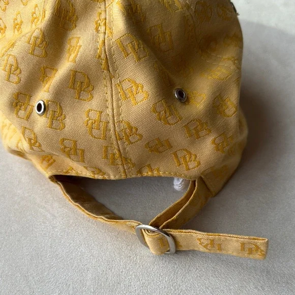 Dooney & Bourke Elegant Yellow Women's Cap with Monogram Design - Picture 3 of 5